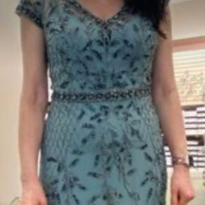 OLEG CASSINI - v-neck beaded sheath dress with illusion sleeves